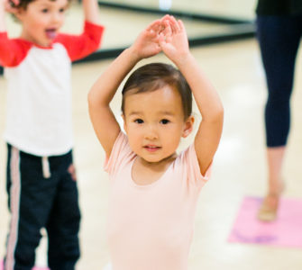 Dance class student twirling in a tutu.