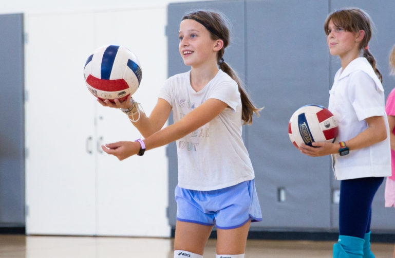 Kids playing volleyball