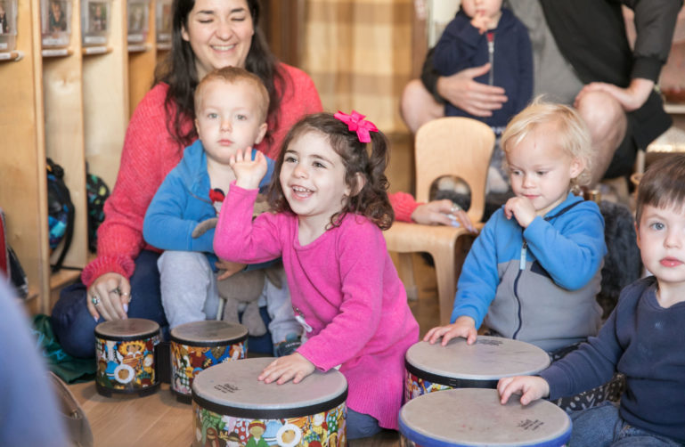 Rosenberg preschool kids playing drums.