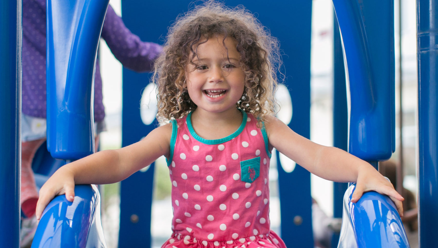 Girl on slide