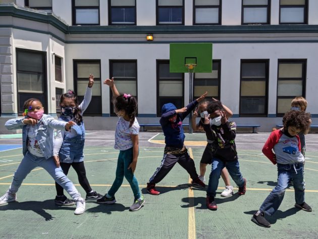 Kids dancing on the playground