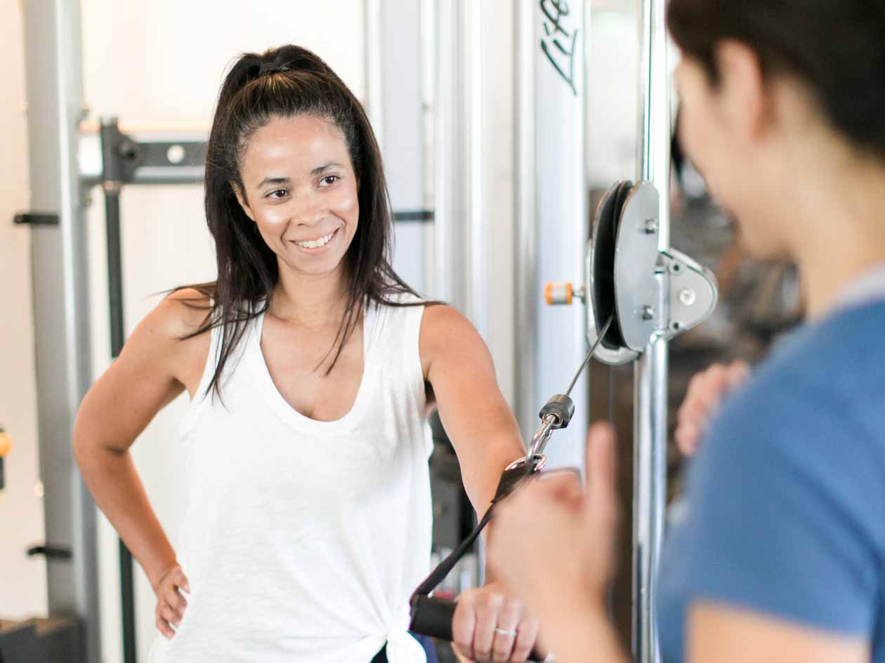 JCCSF member talks with personal trainer