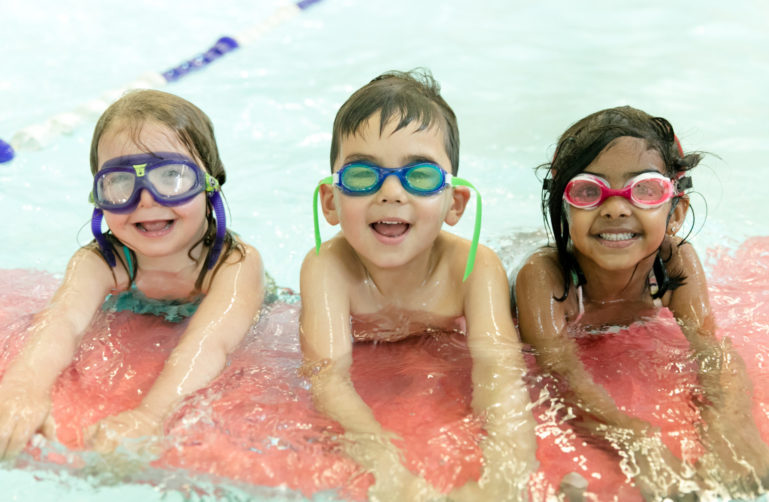 three kids in the pool