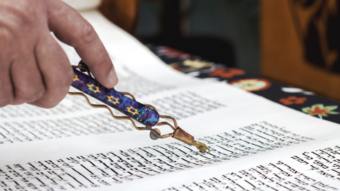 Person reading Torah