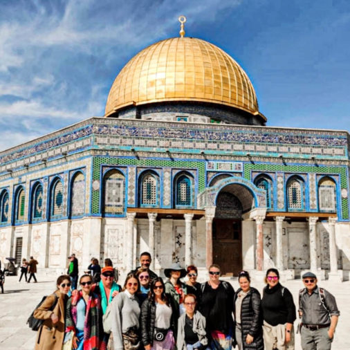 Group photo in front of a building in Israel