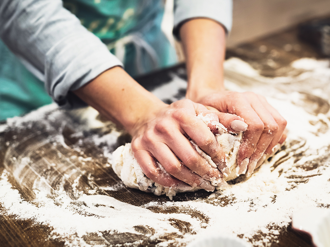 Person kneading dough