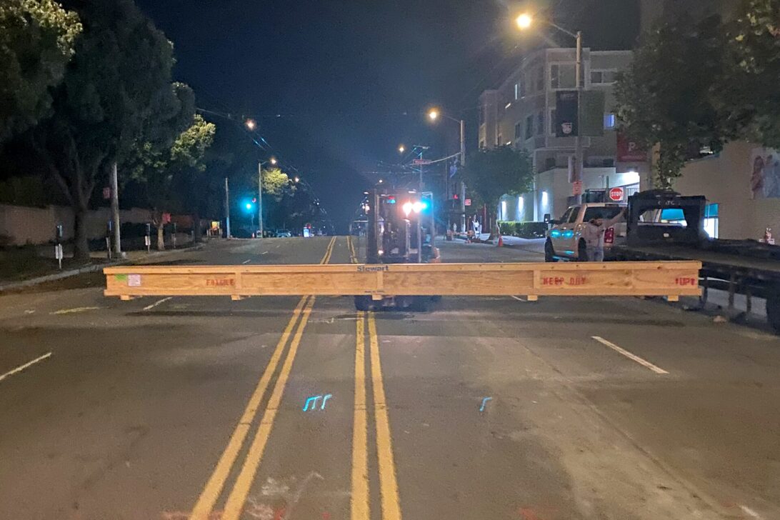 View from stage: covered windows & empty space for fresh, new seating unit